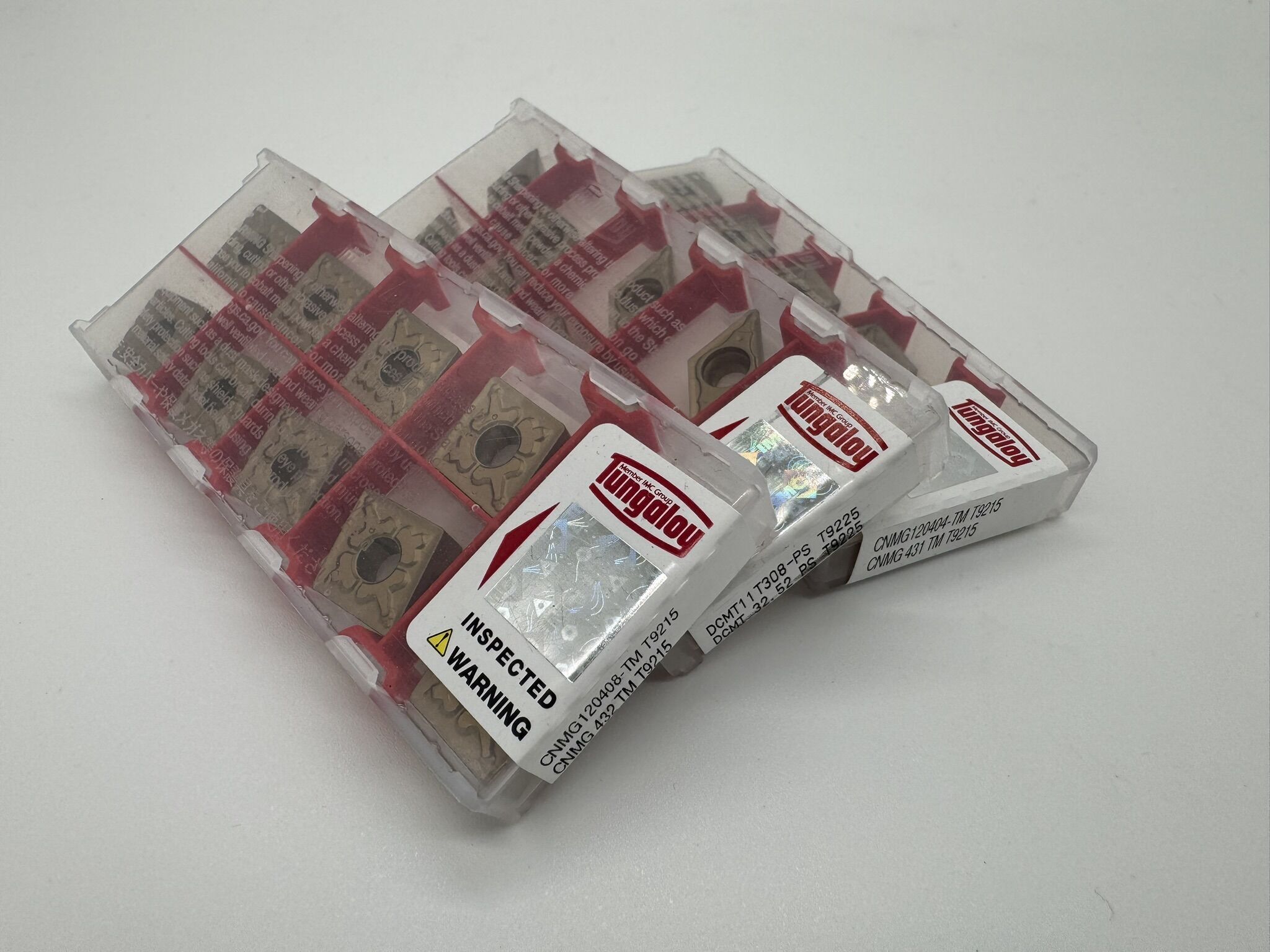 Wendeplatte Tungaloy Tungaloy VBGT110301FN-JS SH730 Wendeplatte in Blister vor weissem Hintergrund., Ersatzins, Inserts, Werkzeugteil, Schnittwerkzeug, Industrieteil