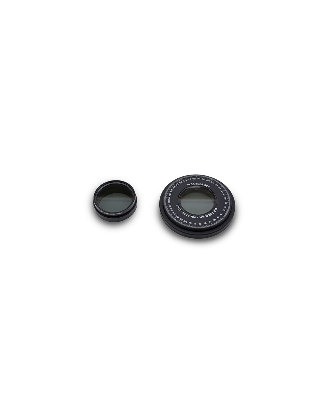 Filter und drehbarer Tisch auf weißem Hintergrund. Die beiden Teile formen den Polarisationssatz für Optika Mikroskope.